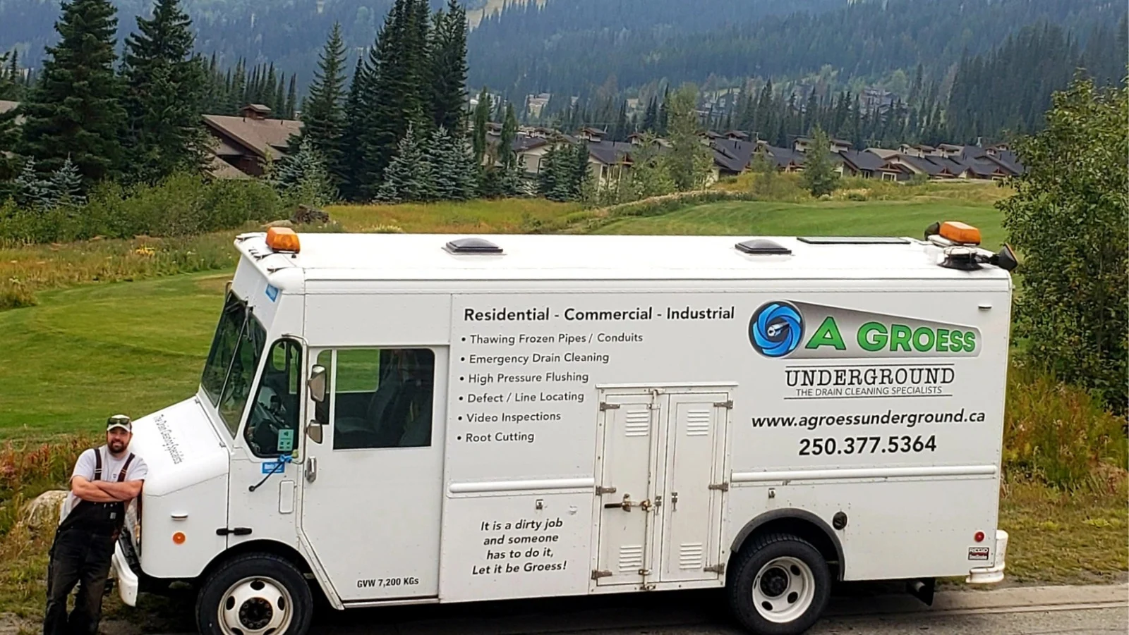 The A Groess Underground service truck at Sun Peaks, with the service list and phone number lettered on the side